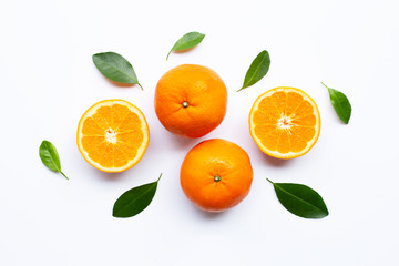 Fototapeta na wymiar Fresh orange citrus fruits with leaves on white background.