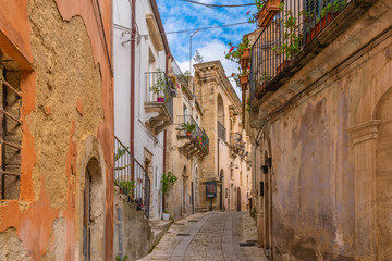 Fototapeta na wymiar Typical italian street in ancient sicilian town Ragusa in Sicily, Italy 