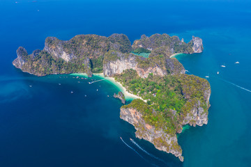 Aerial view of paradise cliffs island with turquoise sea lagoon bay and white sand beach 