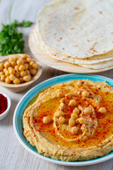 hummus on a white surface