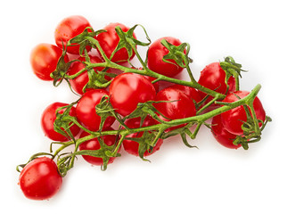 Cherry tomatoes with green leaves top view isolated on white background