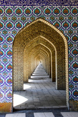 Traditional ornaments and patterns on a blue background in Iranian mosques. Islamic art