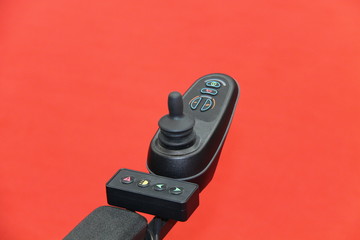 Joystick and Buttons of an Electric Mobility Chair.