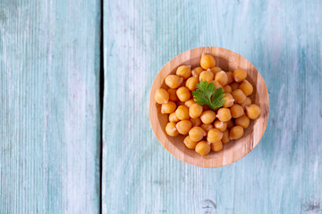 chickpeas on wooden surface