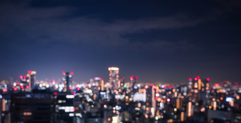 Blur image of City for background.