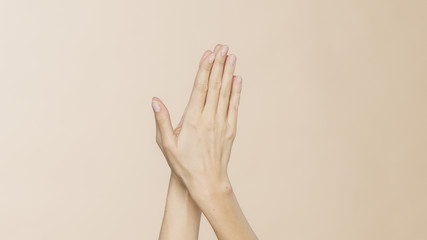 Female hands praying
