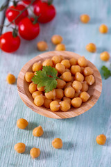 chickpeas on wooden surface