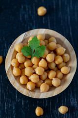 chickpeas on wooden surface