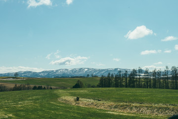 landscape with blue sky and clouds