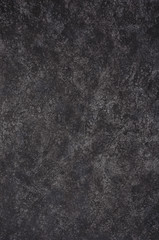 Fototapeta premium Black brown stucco wall background.