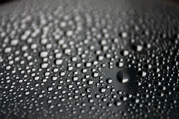 Closeup water condensation on window glass background.