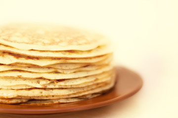 Homemade russian pancake on white background,