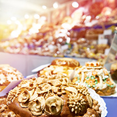 Bread loafs Korovai with patterns in pastry shop