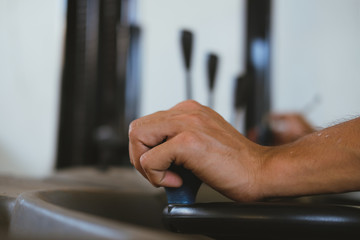 hand operating forklift truck in factory