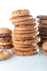 Various shortbread, oat cookies, chocolate chip biscuit isolated on a white background.