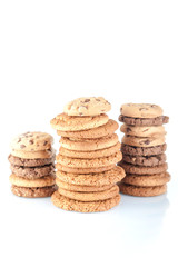 Various shortbread, oat cookies, chocolate chip biscuit isolated on a white background.