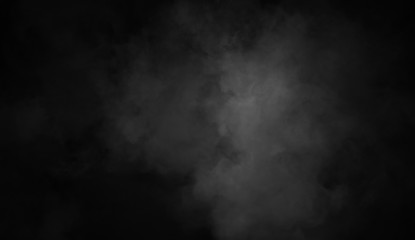 Smoke on the floor . Isolated black background . Misty fog effect texture for text or space