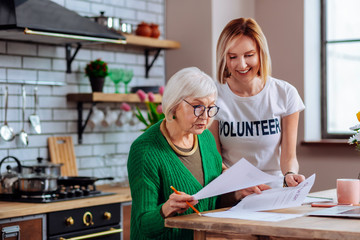 Alluring volunteer making clear for dame notification about overdue loan