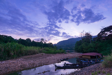 sunrise over Kuala Tahan jetty - a gateway to Taman Negara or National Park of Malaysia.