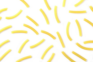 Macaroni, raw pasta isolated on white background, top view