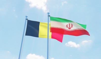 Iran and Belgium, two flags waving against blue sky. 3d image
