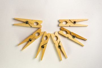 wooden clothespins on white background