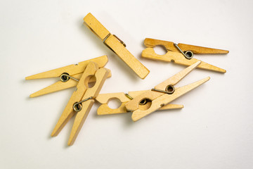 wooden clothespins on white background