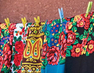 iranian traditional woman scarfs, fragment photo. colorful scarf in street market, qeshm island, iran