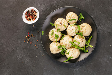 Fototapeta na wymiar Khinkali. Asian dumpling with spices