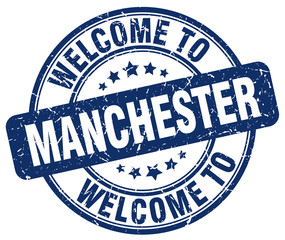 welcome to Manchester blue round vintage stamp