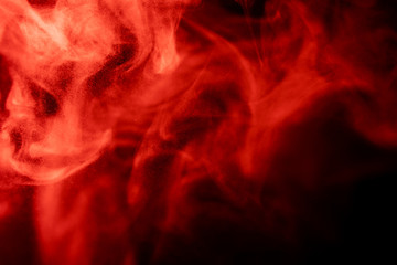 Abstract powder splatted background,Freeze motion of red powder exploding