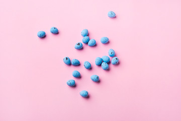 Blue decor easter eggs on pink background