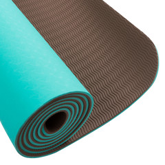 fragment of mat for fitness or for yoga, color combined, turquoise and brown, on a white background