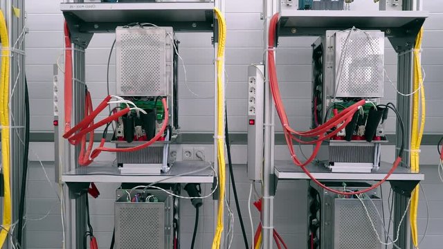 Test benches in the laboratory for the production of microprocessor-based protection and automation devices.