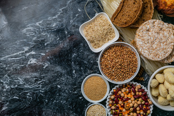 Gluten free diet concept - selection of grains and carbohydrates for people with gluten intolerance, copy space