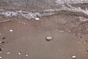 Exotic sandy beach, tropical blue mediterranean sea with waves and sea foam. Beautiful natural environment, panorama, landscape. Idyllic seaside resort in summer season, paradise and amazing scene.