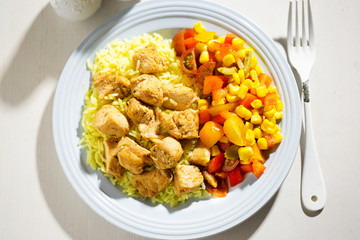 Chicken with rice and vegetable salad 