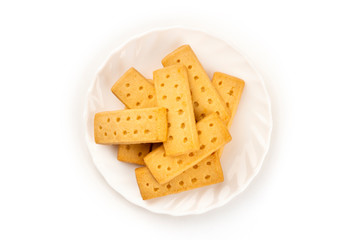 A photo of Scottish shortbread butter cookies, shot from the top on a white background