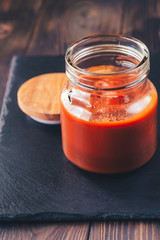 Fototapeta na wymiar Barbecue sauce in the glass jar
