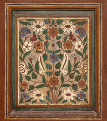 Beautiful ancient ornament painted on wooden shutter