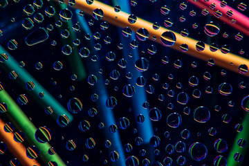 Background of water drops on glass. fresh drops background blue glass. Wet rainy background, water...