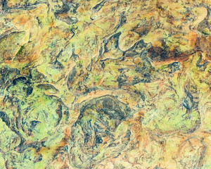 Green, orange, blue and yellow sedimentary rocks - colourful rock layers formed through cementation and deposition - abstract graphic design backgrounds, patterns, textures