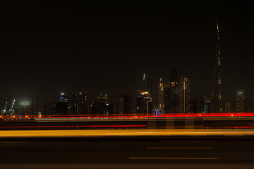 Modern city panoramic landscape by night. Beautiful Dubai cityscape. United Arab Emirates