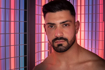 Portrait of muscle guy in collagen solarium