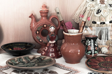 Ukrainian national dishes and musical pipe in a jug