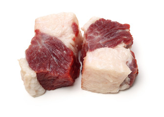 huge red meat chunk isolated over white background 