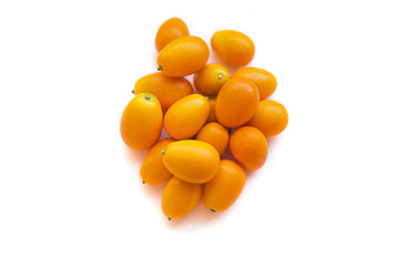Kumquats or cumquats (Citrus japonica) isolated on white background