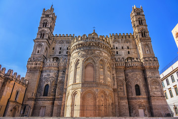 Fototapeta na wymiar Arab-Norman architectural style of Cathedral Santa Vergine Maria Assunta (was erected in 1185) in Palermo, Sicily, Italy. Eastern side details.
