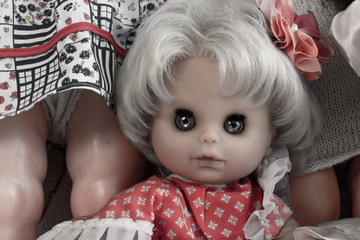 Female doll face with creepy eyes