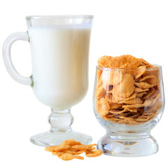 Yogurt with cornflakes and walnuts in a glass goblet